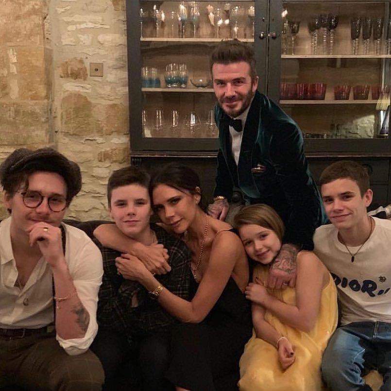  The Beckhams 'enjoy family events and are proud parents', a source said