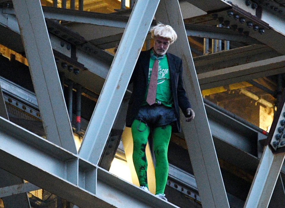  A tree surgeon dressed as Boris Johnson and climbed Big Ben during protests