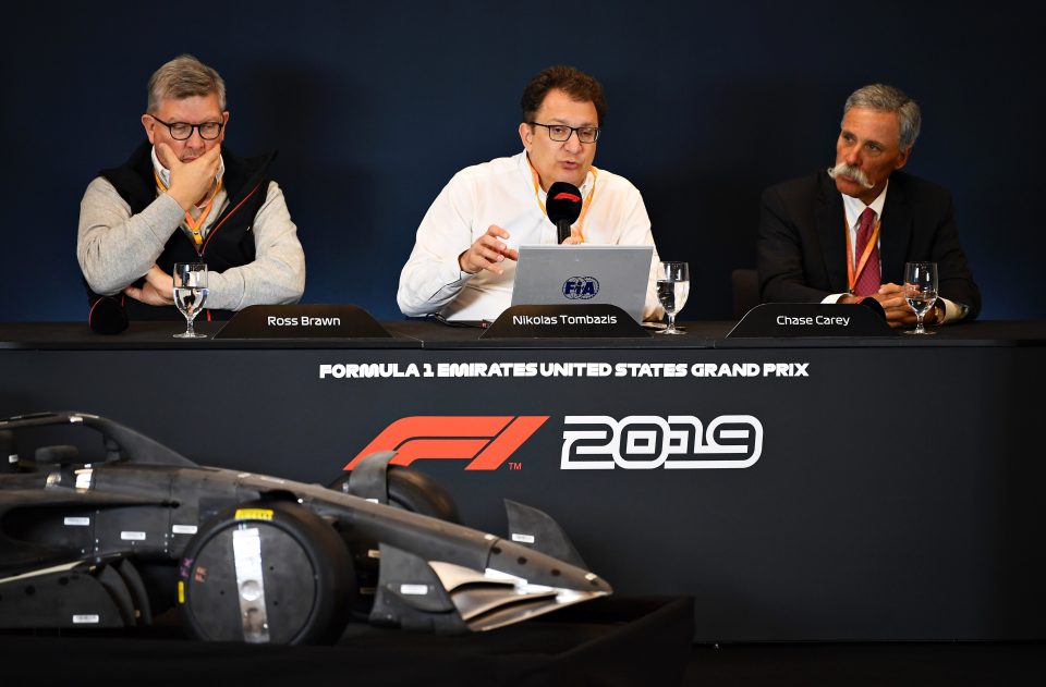  F1 Managing Director Ross Brawn, left, and Formula One Group CEO Chase Carey, right, were among those to introduce the new rules