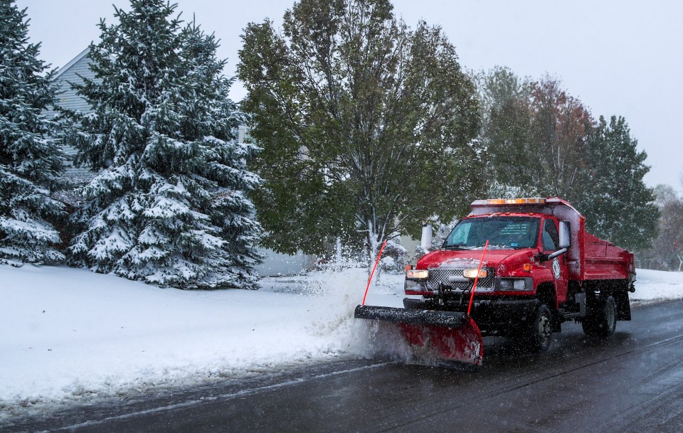  A snowplow clears the streets in Round Lake Heights, Illinois