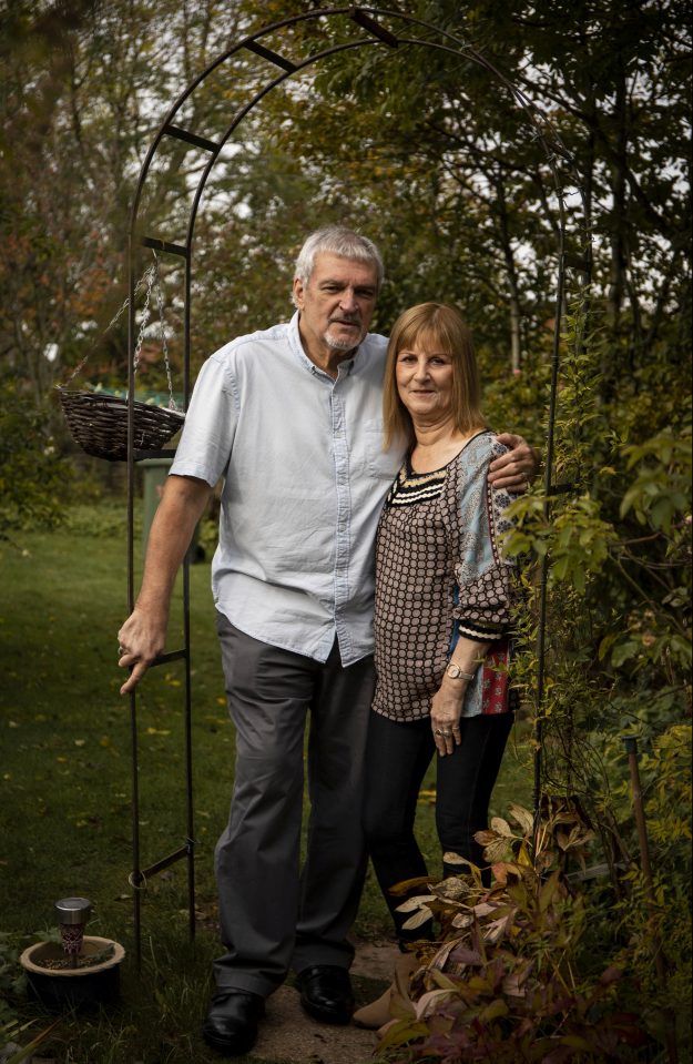  Shirley, with her husband Bob, in the garden where her cat, Chan, bit her