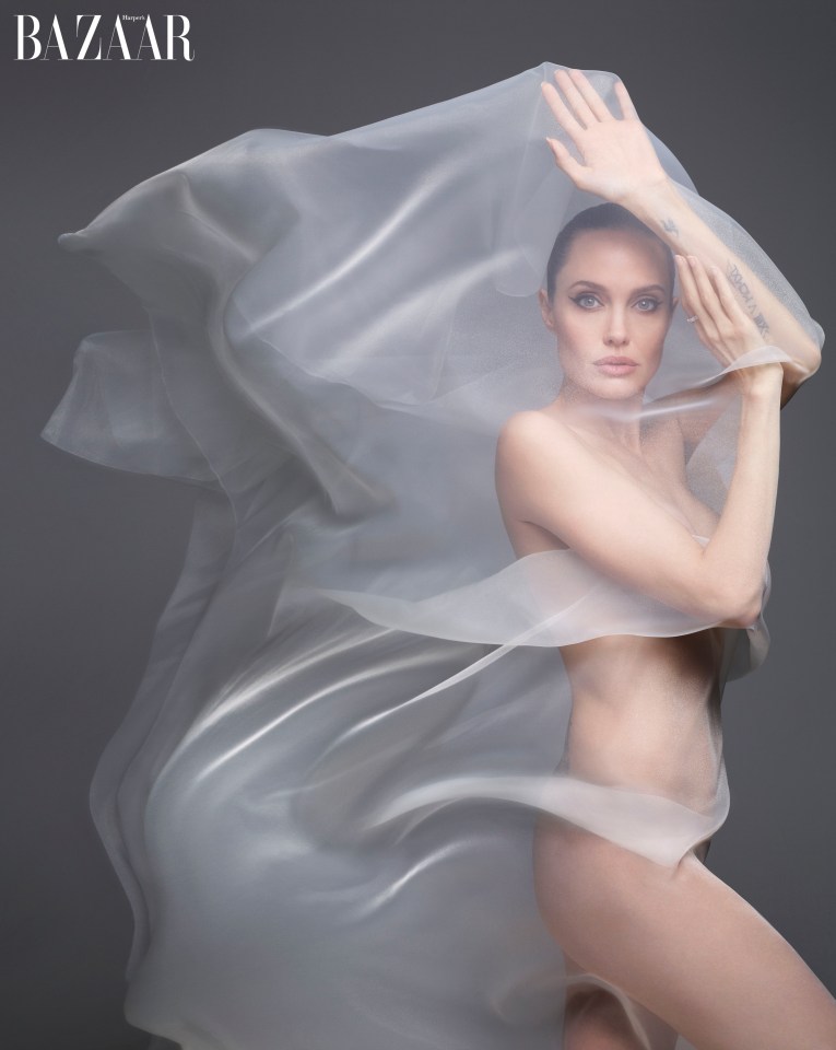  Angelina Jolie looks incredible as she strips naked for new magazine shoot