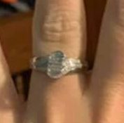 The positioning of the diamonds has made the ring seem rather phallic