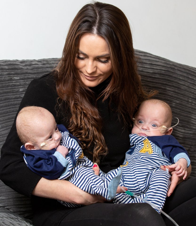  Proud mum Talia Keates cradle her 'little miracles' — Britain’s tiniest surviving twins