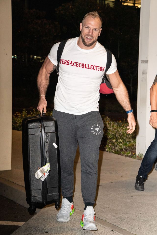  The fitness icon lugged around his huge case with ease