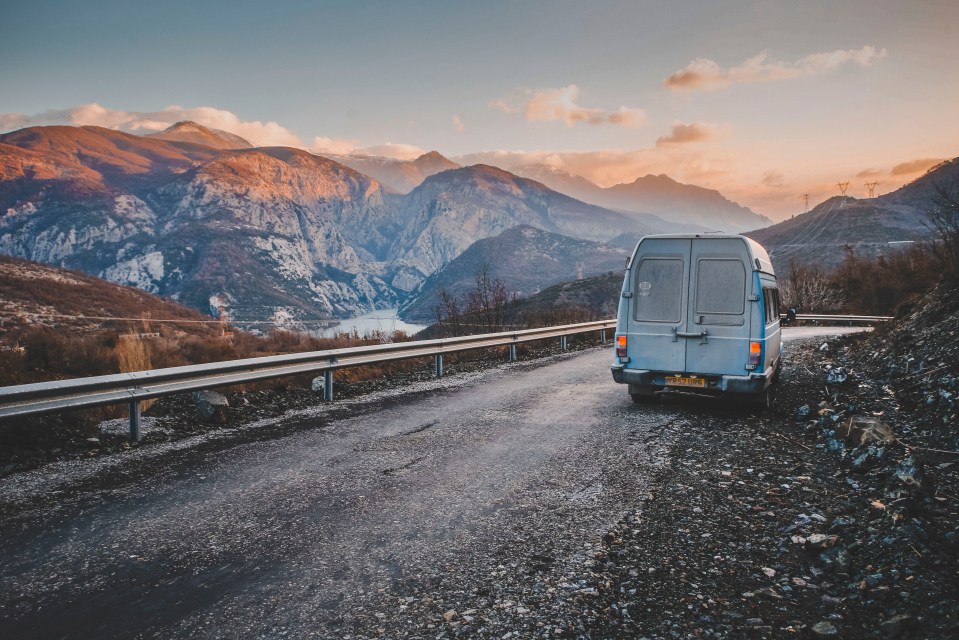  The converted van in Albania with an amazing view of mountains in the background