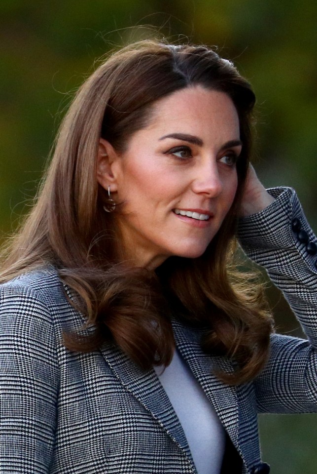 Kate wore her hair down in slight waves 