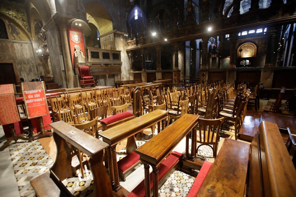  Staff at St Mark's basilica piled up pews and chairs to keep them safe