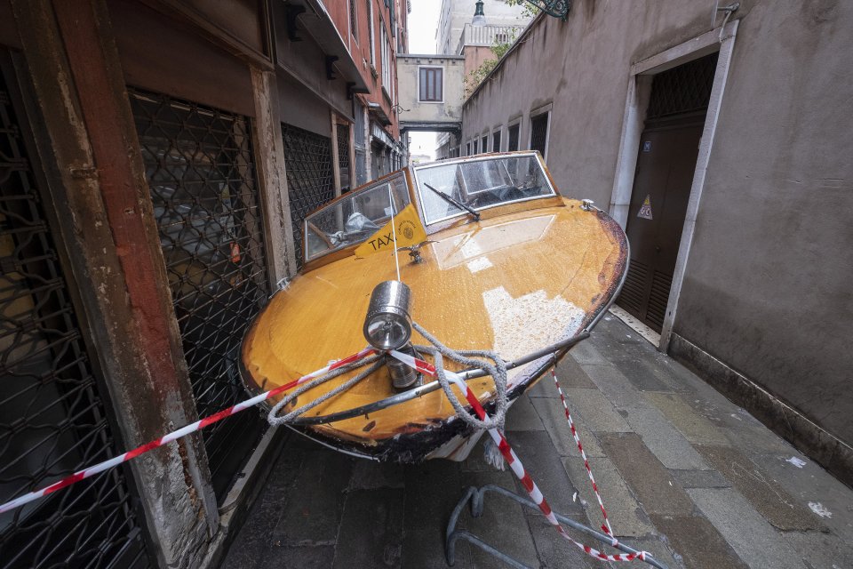  A boat strapped down near St Mark's Basilica