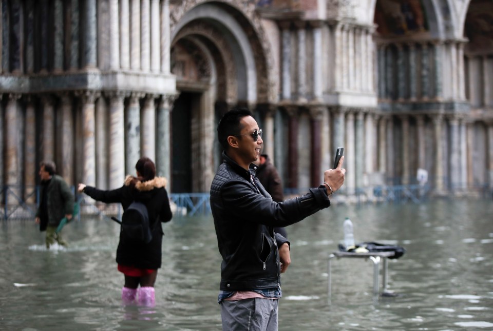  However some tourists couldn't resist taking a quick selfie