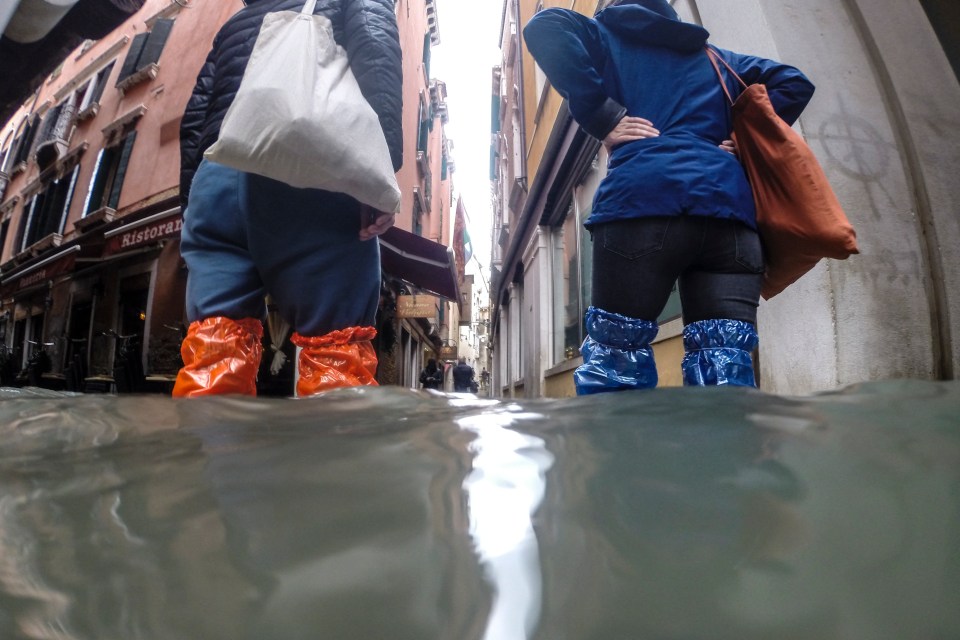  The streets of Venice have been submerged after a damaging tidal surge