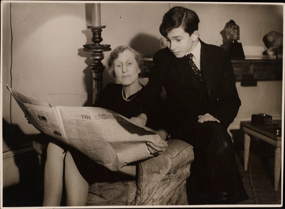  Lady Violet Bonham Carter with her son Raymond in their family home during World War Two