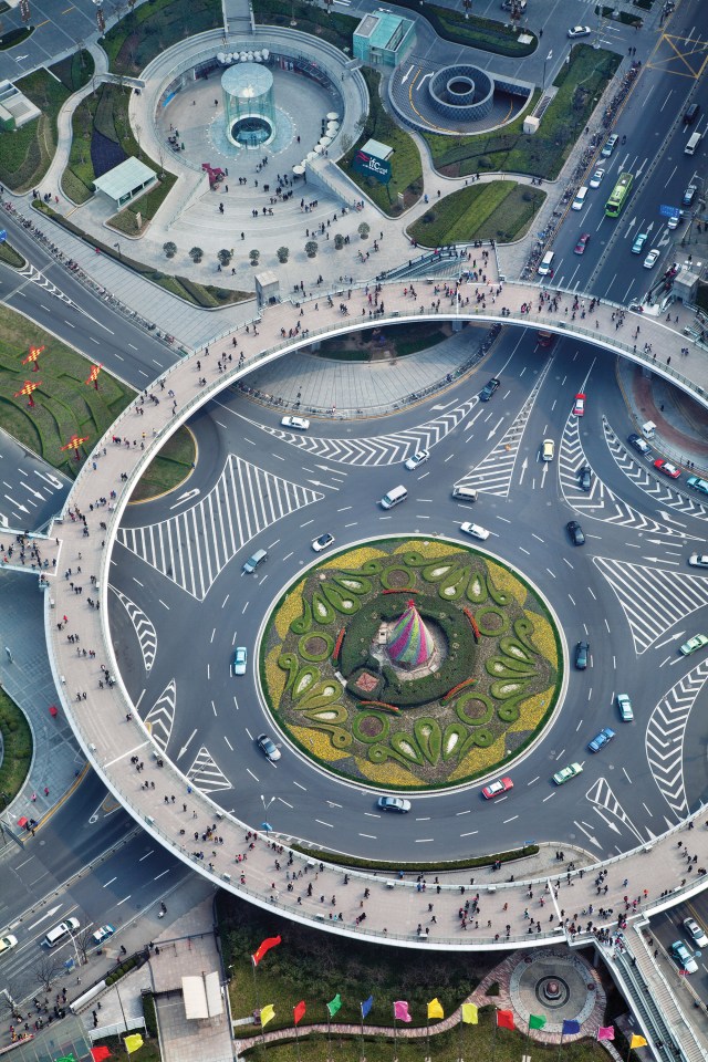  An enormous roundabout functions as an ornament and traffic control in the financial heart of Shanghai, China March 2012