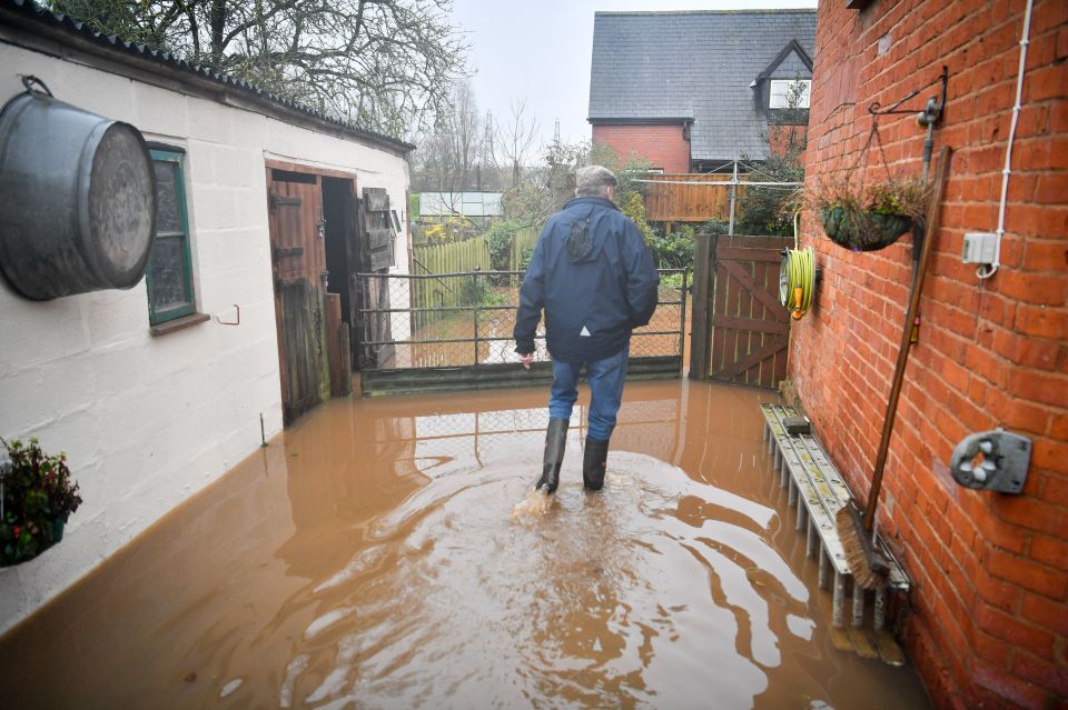 Homes in in Clyst St Mary, Exeter, flooded after where heavy rain has caused the River Clyst to burst its banks