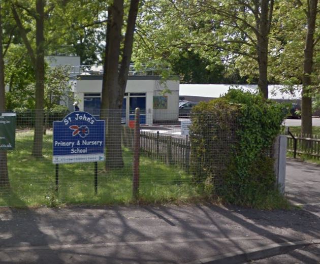  St John's Primary & Nursery school in Woking, Surrey has come under fire after a link led parents to a porn site