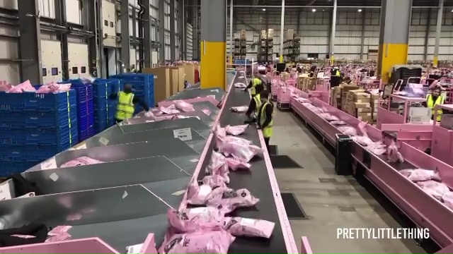  There's even a pink and black conveyor belt for sorting parcels