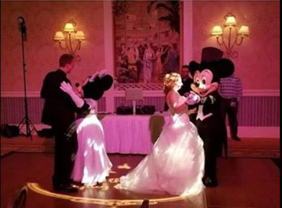 A couple have divided opinion with their first dance with Mickey and Minnie Mouse rather than each other