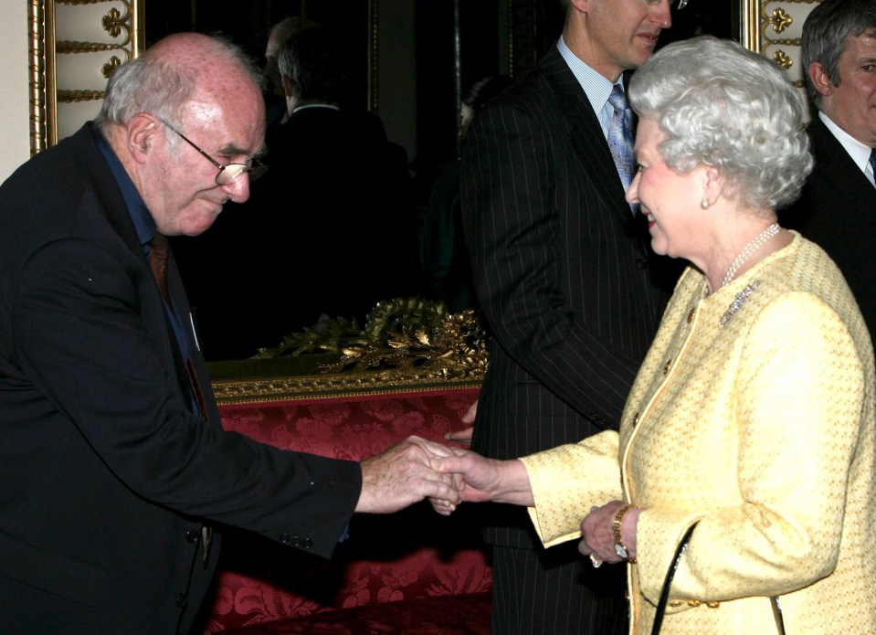  Clive James meeting the Queen at Buckingham Palace in 2006