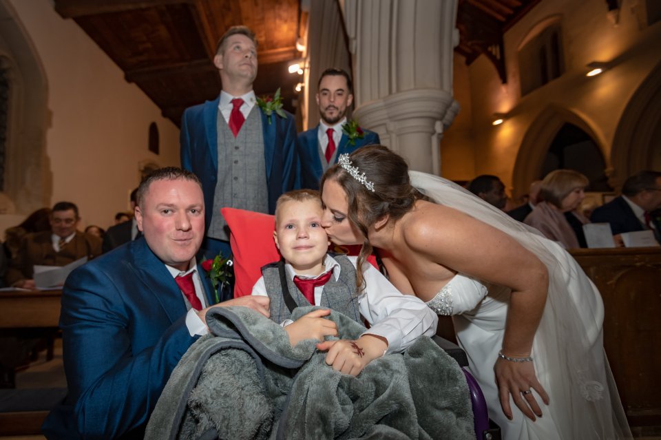  Ethan later posed for photographs with his family both inside and outside the church