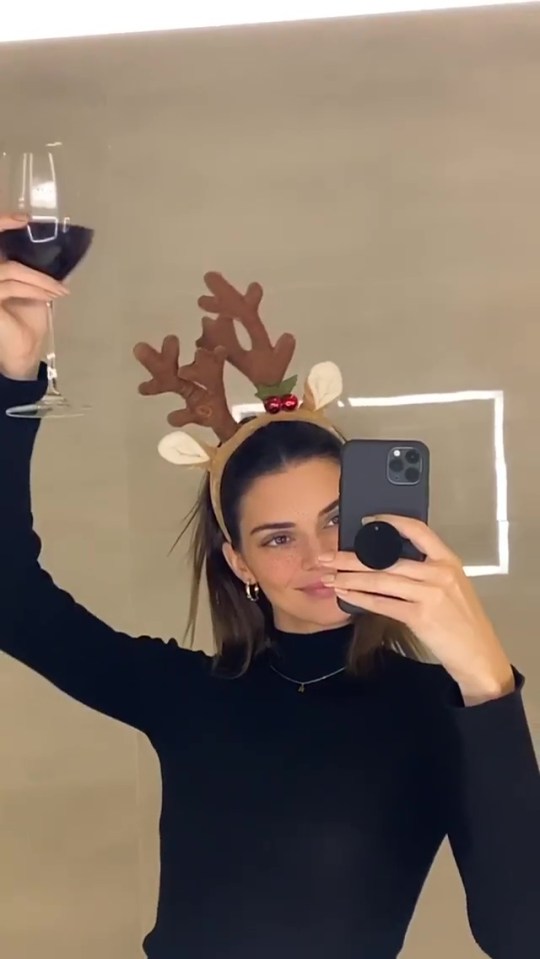  The reality star took some time out of her celebrations to take a quick photo of her with some festive headgear on