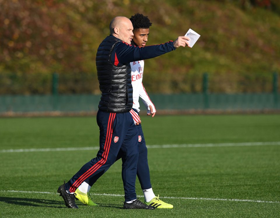  Interim coach Freddie Ljungberg shows Reiss Nelson his ideas