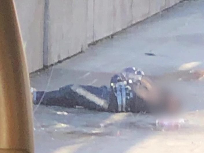  This shocking photo shows the terrorist knifeman wearing a fake suicide vest