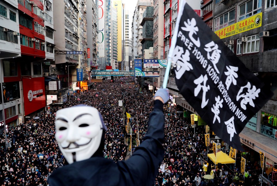 Hundreds of thousands of Hong Kongers take to the streets as protests reach their seventh month