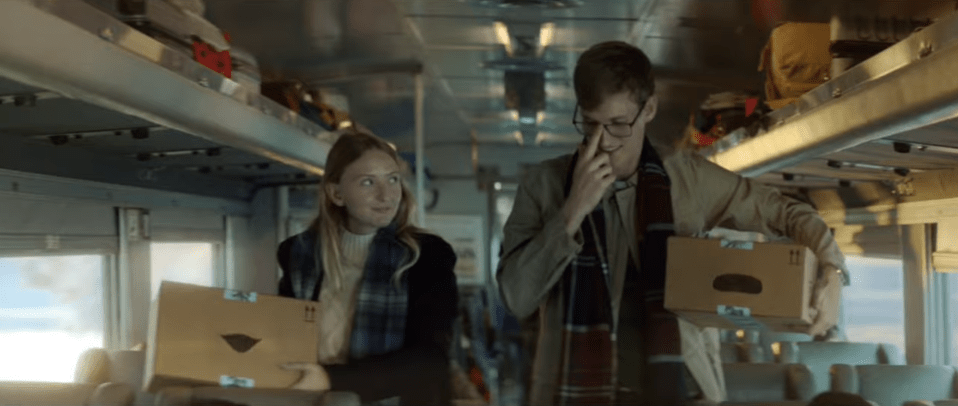 Amazon advert - young people on train with parcels