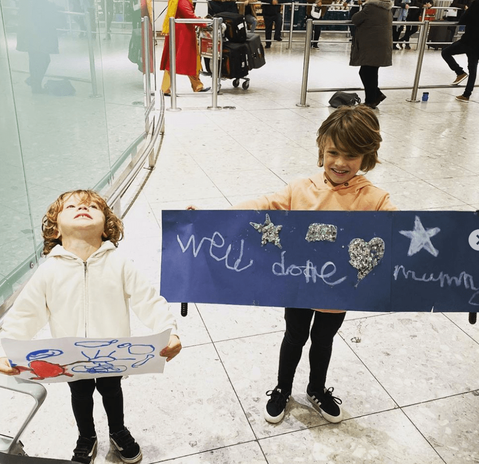  Frankie's sons welcomed her back with these adorable banners