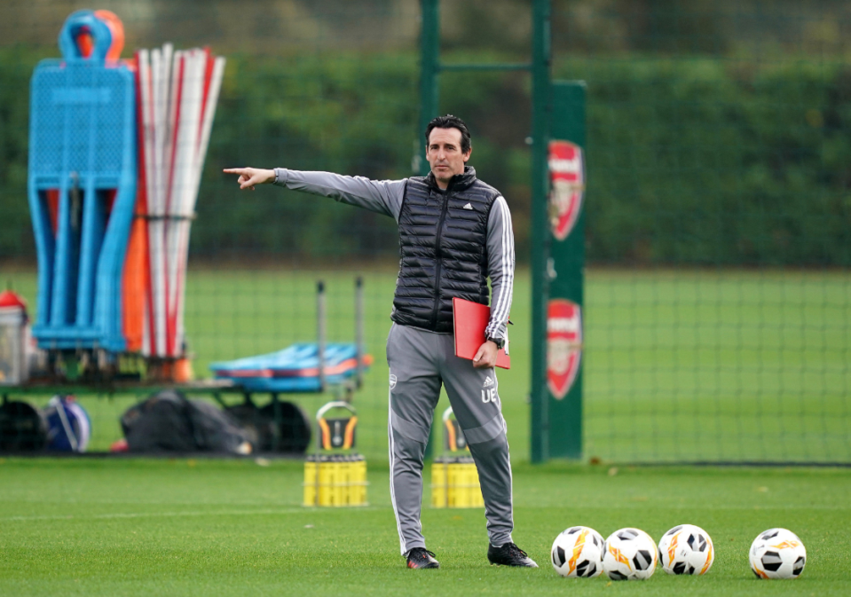  Gunners boss Unai Emery dishes out instructions during training at St Albans