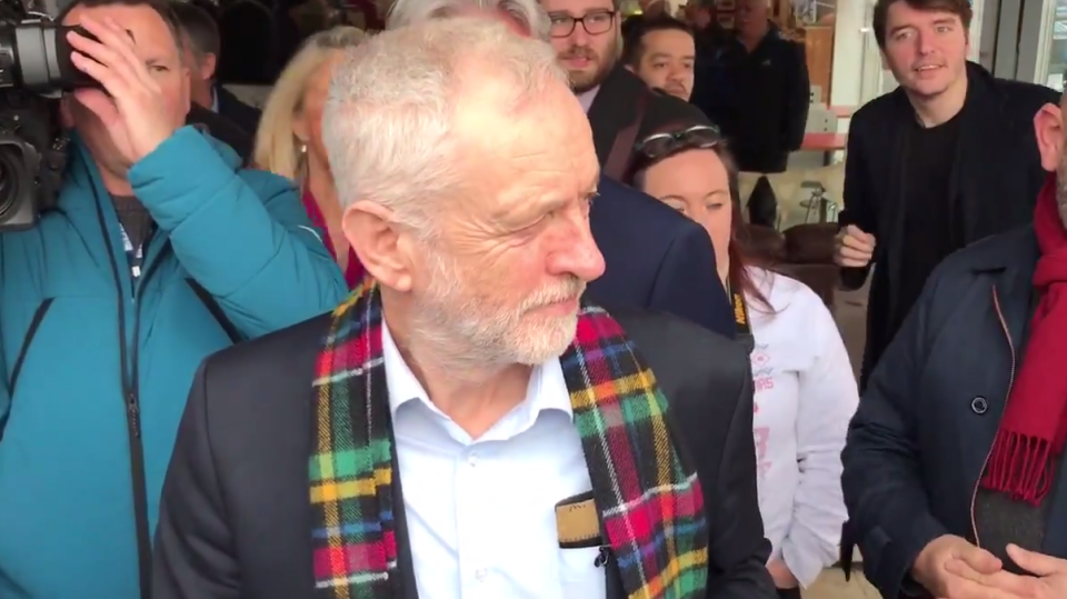  Jeremy Corbyn is heckled by Mr Cameron during a visit to Scotland