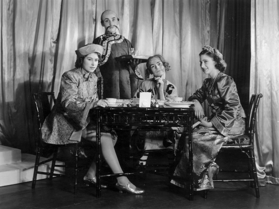  The family enjoy a tea party on Christmas Eve, as seen here in 1943