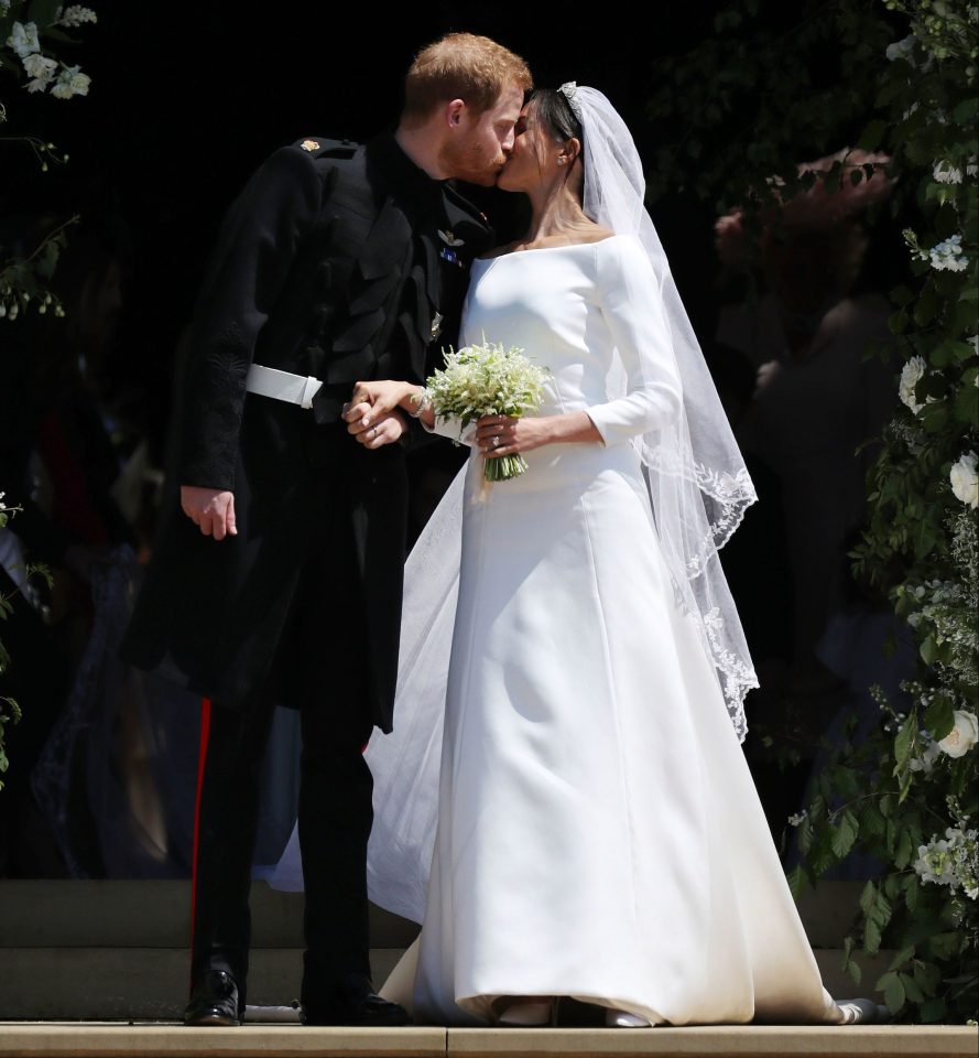 Harry and Meghan kiss on their wedding day in 2018