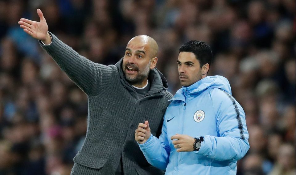  Arteta (right) joined Guardiola's backroom staff in 2016