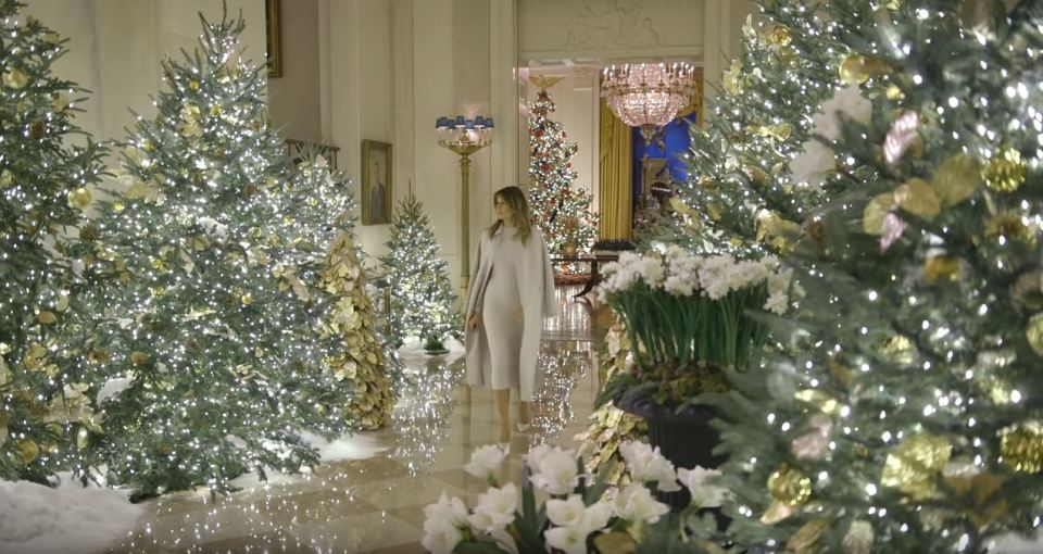  The grand display features stunning patriotic ornaments, fake snow, and a large advent calendar