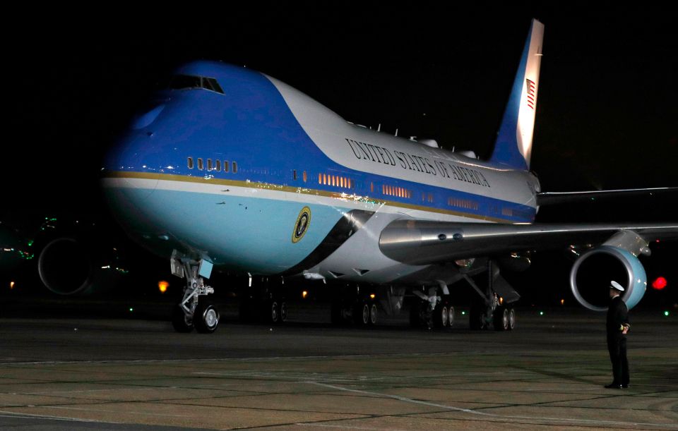  Air Force One, carrying the Trumps, taxis on the tarmac after landing at Stansted Airport