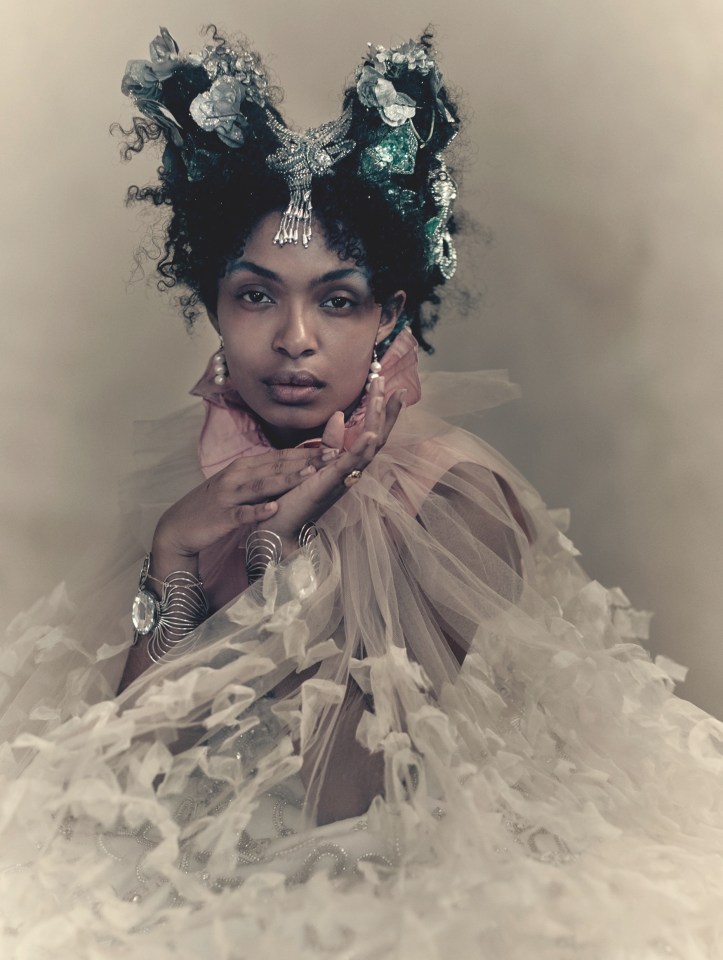  Yara Shahidi, 19, dons some Christmas tree decorations in her hair for the calendar