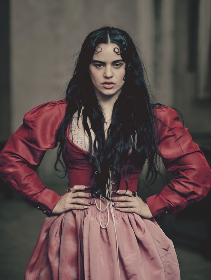  Flamenco singer Rosalia, 26, poses in jeans and a crop top for her close up and later changes into a red Shakespearian dress