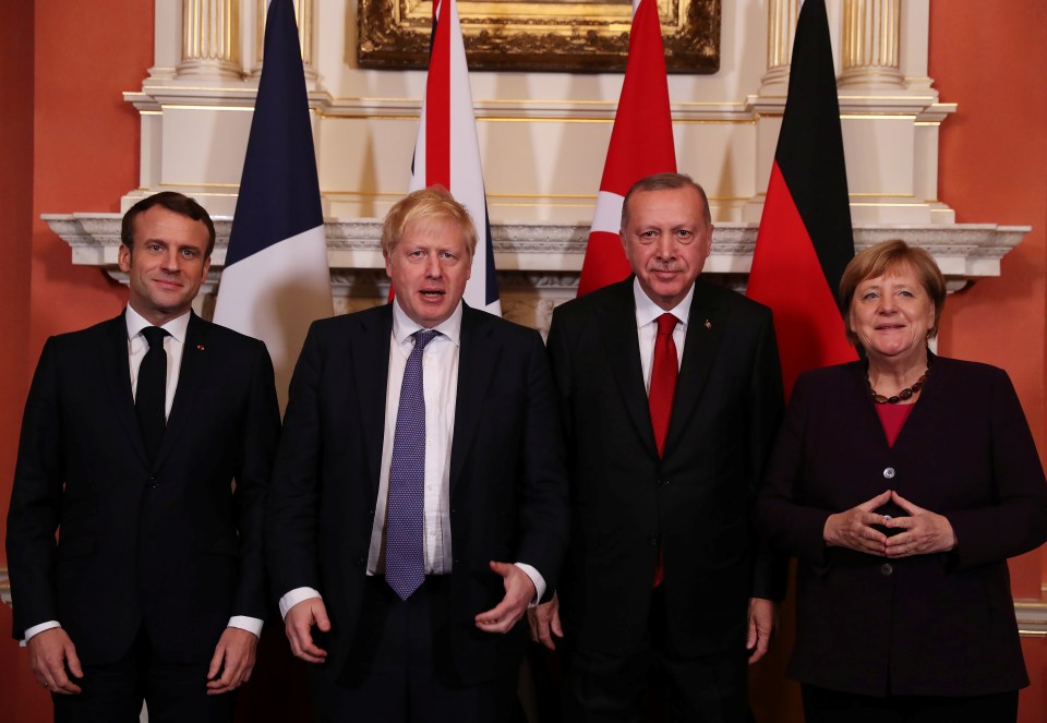  (From left to righT) France's President Emmanuel Macron, Britain's Prime Minister Boris Johnson, Turkish President Tayyip Erdogan and German Chancellor Angela Merkel pose as they meet at Downing Street ahead of the NATO summit in London