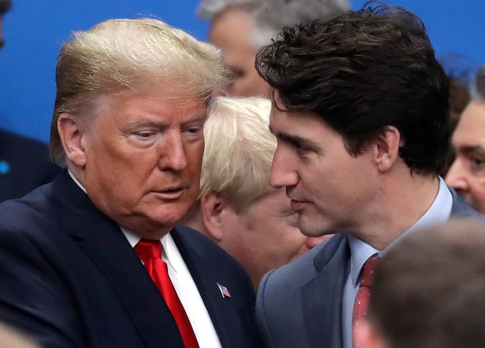  Donald Trump and Trudeau share an awkward moment on stage at the Nato summit