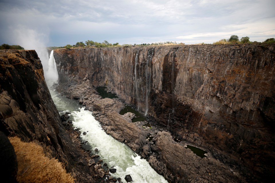  Victoria Falls has been reduced to a trickle along much of its mile-wide curtain in this photo from December 4