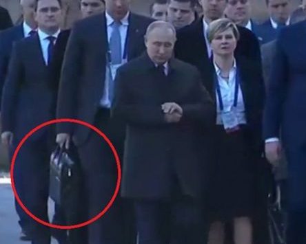  One of Putin's nuclear briefcases being carried by a security officer