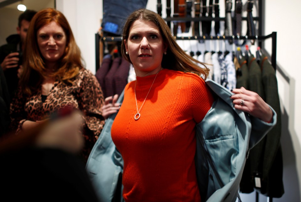  Lib Dem leader Jo Swinson, pictured in a local clothing store during her election campaign, has revealed she was urged to wear lower cut tops to help win votes