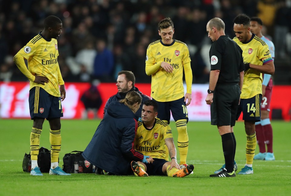  Xhaka came off injured for Arsenal with a suspected concussion as the Gunners came from behind to beat West Ham