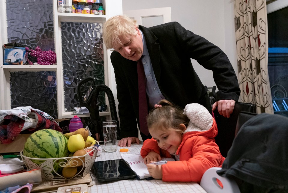  The PM with the couple's four-year-old daughter Grace