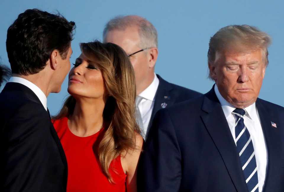  First lady Melania Trump kisses Canada's Prime Minister at a summit in France