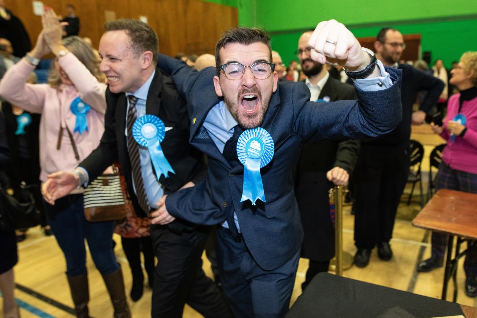  Conservatives celebrate their narrow win in the Bury North count