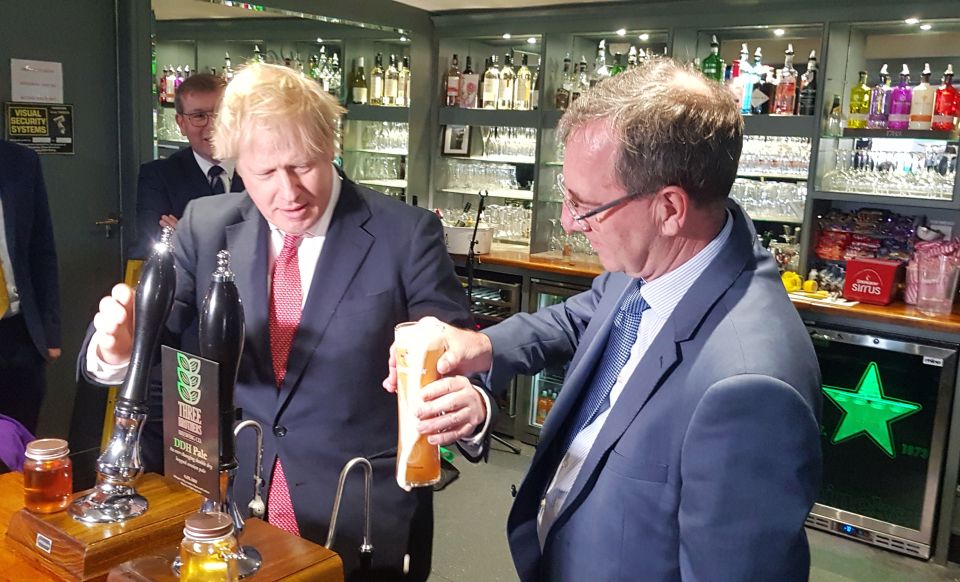  Boris Johnson pulls a pint with Sedgefield's new Conservative MP Paul Howell at Sedgefield cricket club