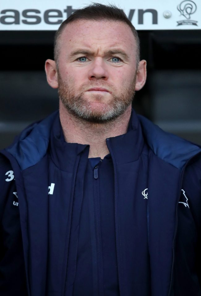  Wayne Rooney was snapped with a woman getting into a hotel lift after a boozy night in the US