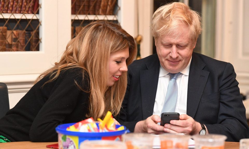  Boris and Carrie check his phone for updates as the results slowly come in on election night